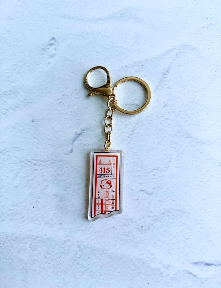 Orange Muni and Kitty Transfer Epoxy Keychain