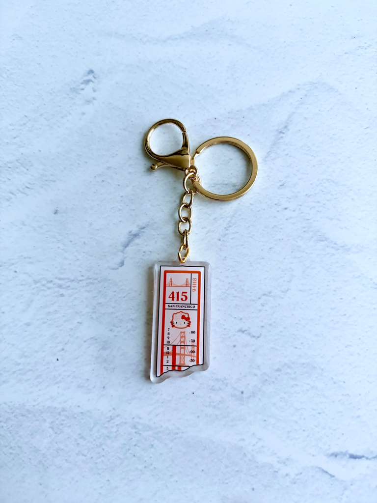 Orange Muni and Kitty Transfer Epoxy Keychain